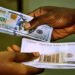 Naira Weakens to N1,359/$ After CBN Cuts Interest Rate to 26.5%